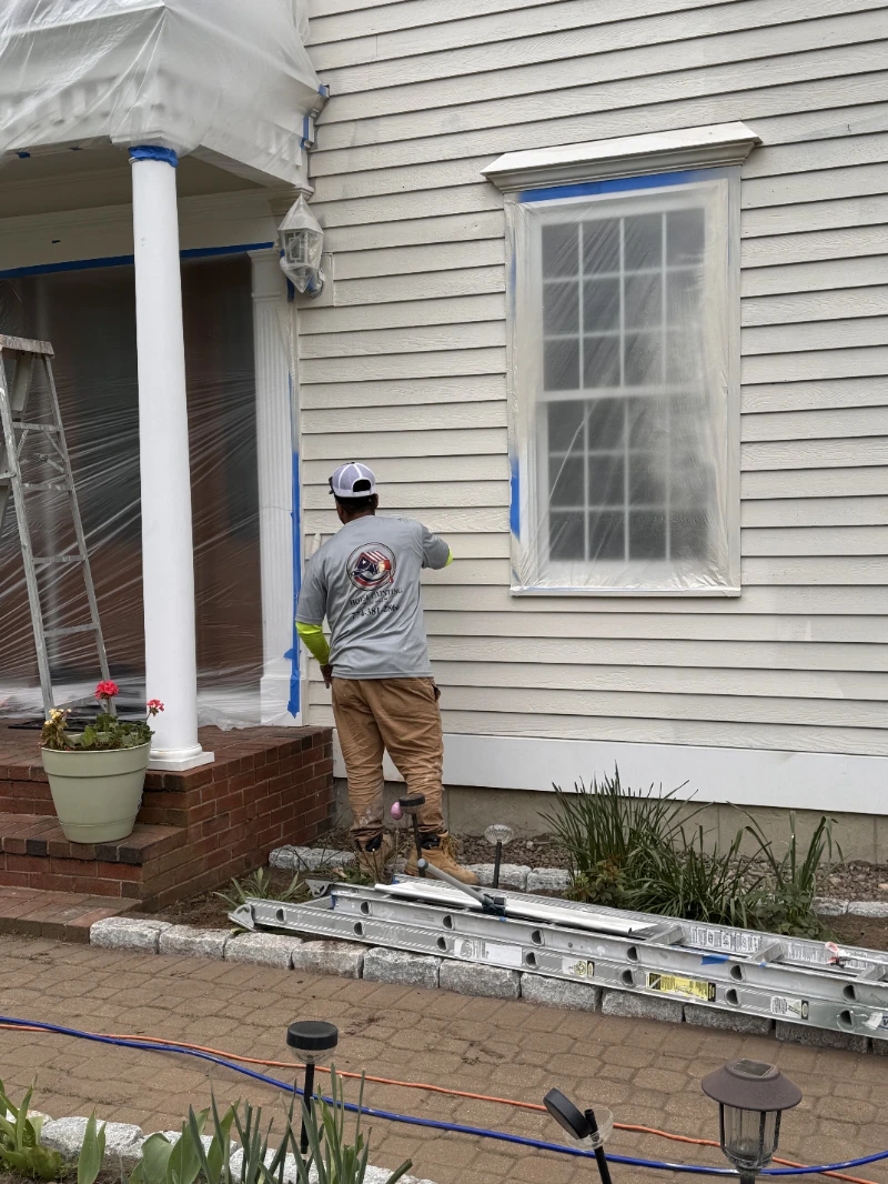 House Painting crew at work on a New England home